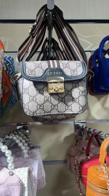 شنطة جلد كاروهات