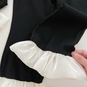 طقم أسود بلوزة وبنطال كشكشة ورد